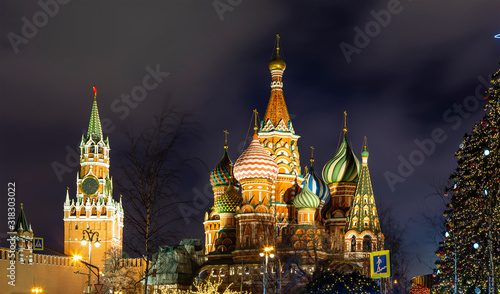 Saint Basil cathedral ( Temple of Basil the Blessed), Spasskaya Tower and Christmas (New Year) decoration, Moscow, Russia. View from Zaryadye Park. Journey to Christmas, Moscow seasons