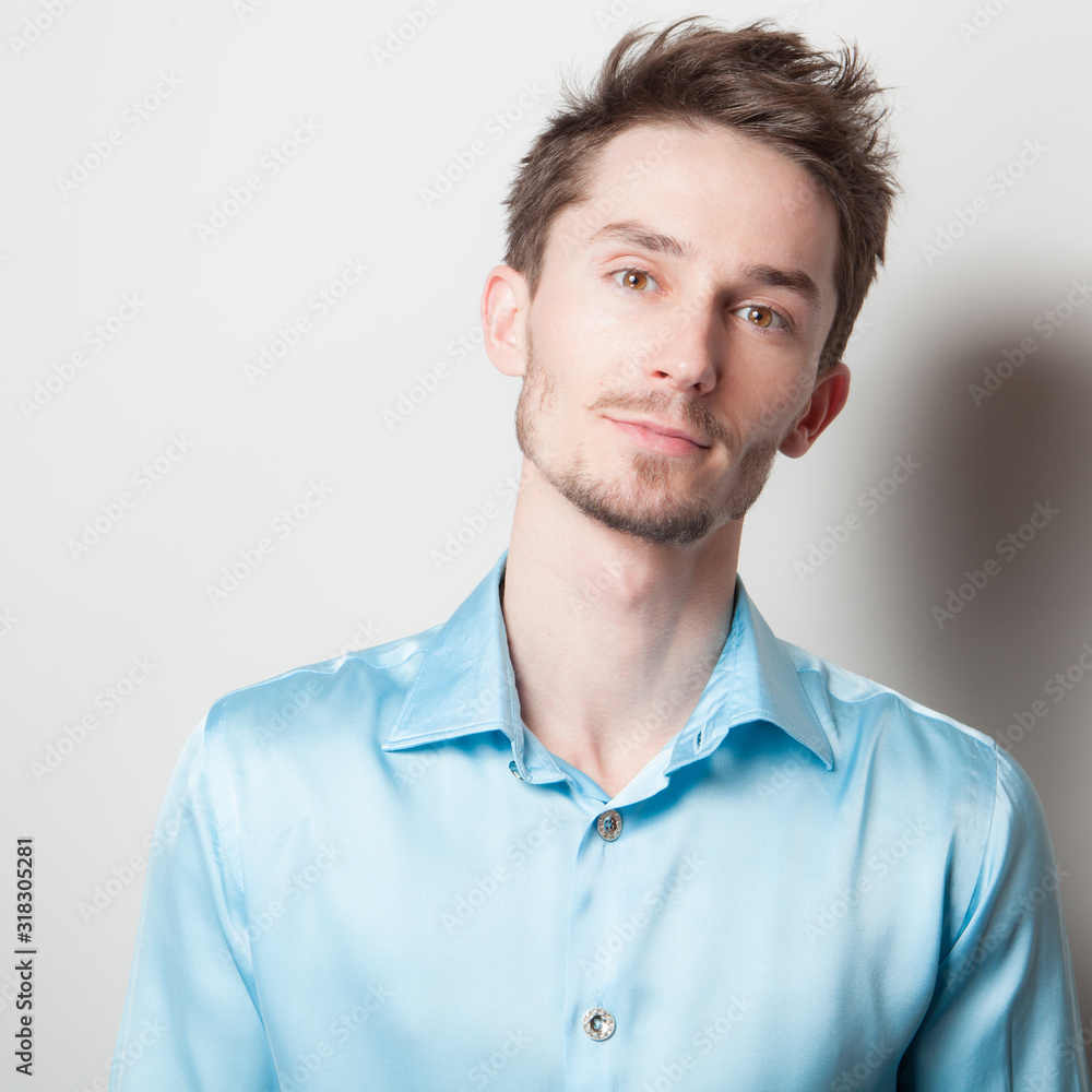 Handsome young elegant man studio portrait. Handsome young elegant man studio portrait.