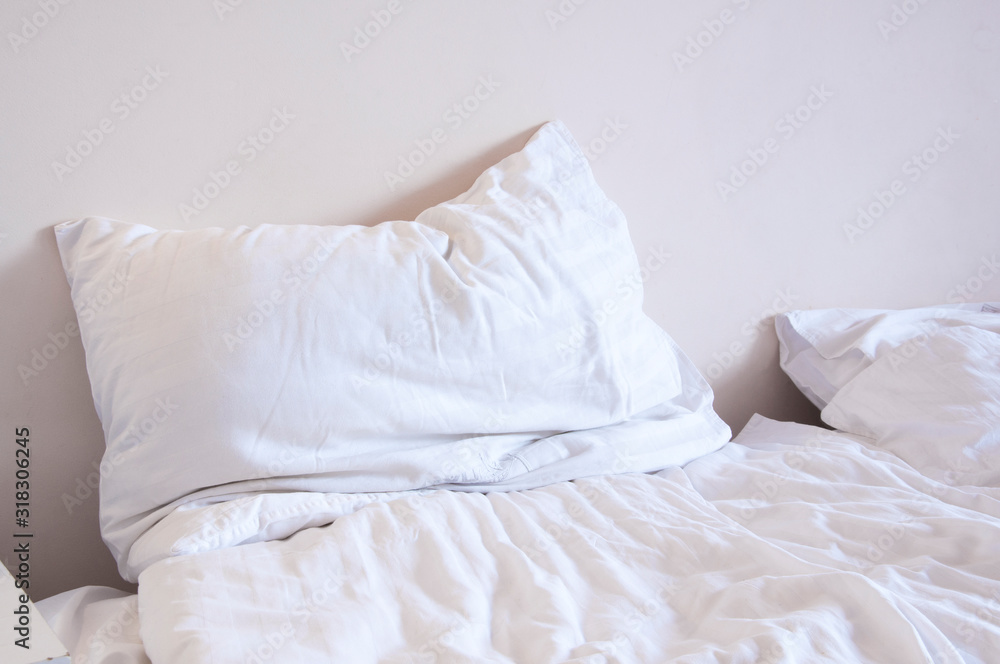 White bedding. Pillow blanket. Bed in the room White bedding. Pillow blanket. Bed in the room