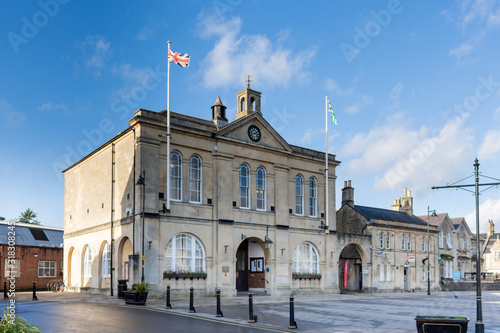 Melksham Town Hall against a blue winter sky with flags flying on a sunny winter late afternoon photo