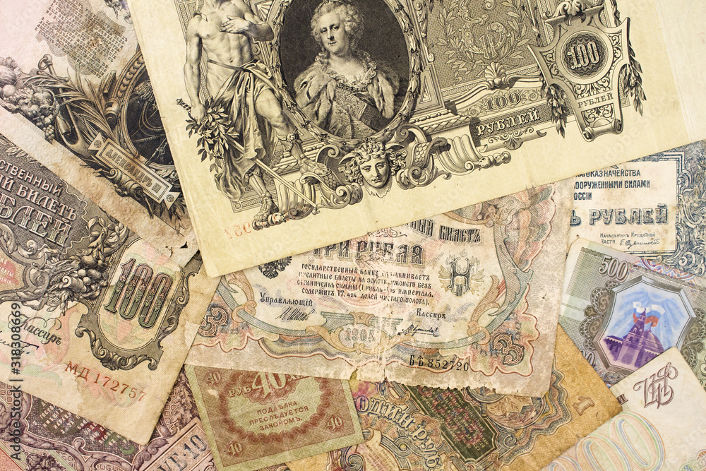 Background of different vintage banknotes of Russia of different denominations close-up