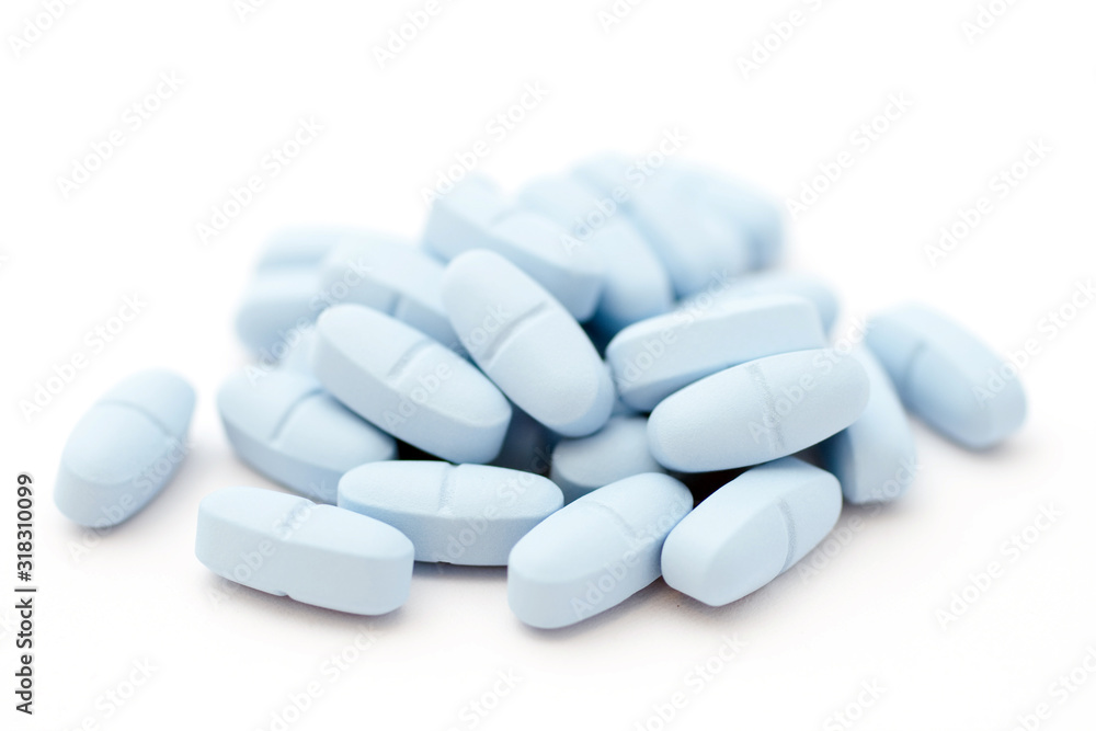 Blue pills on white background Blue pills on white background