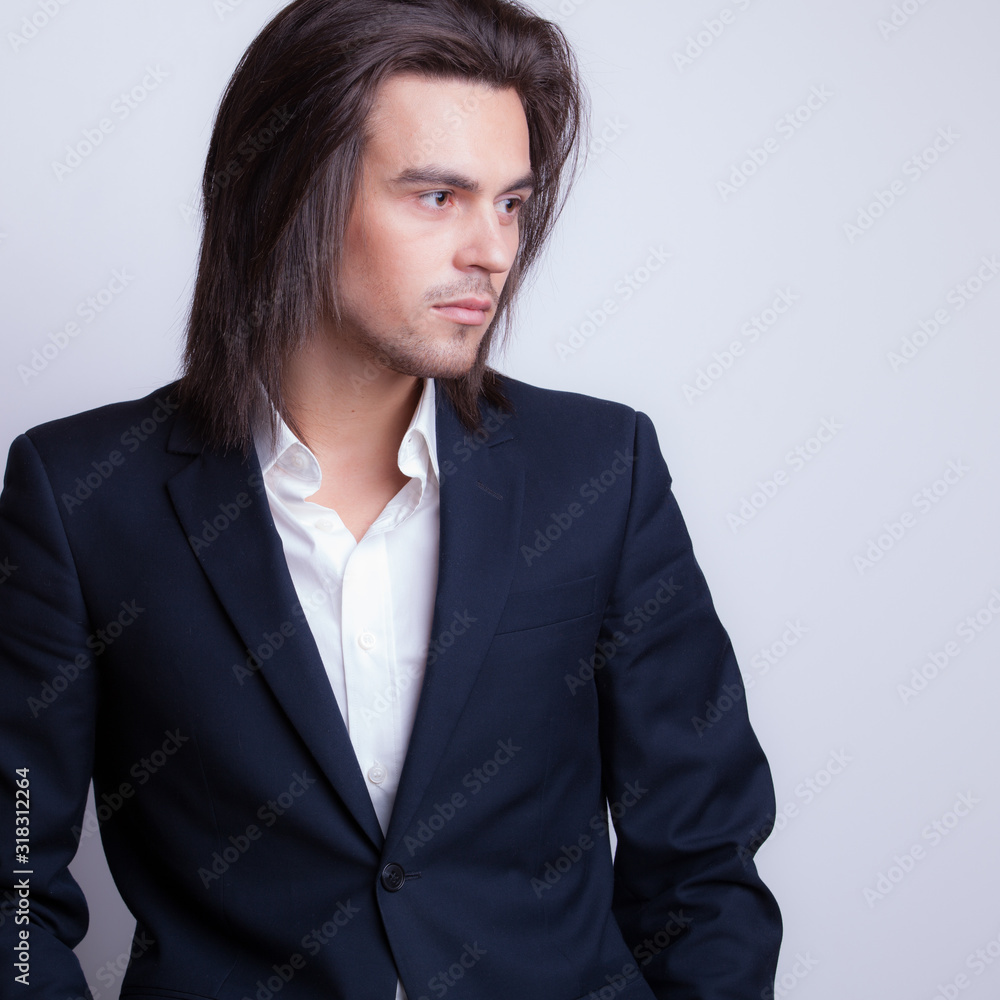 Handsome young elegant man studio portrait. Handsome young elegant man studio portrait.