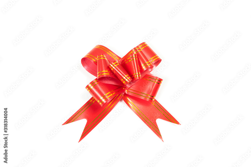 red gift bow with yellow stripes on a white background top view red gift bow with yellow stripes on a white background top view