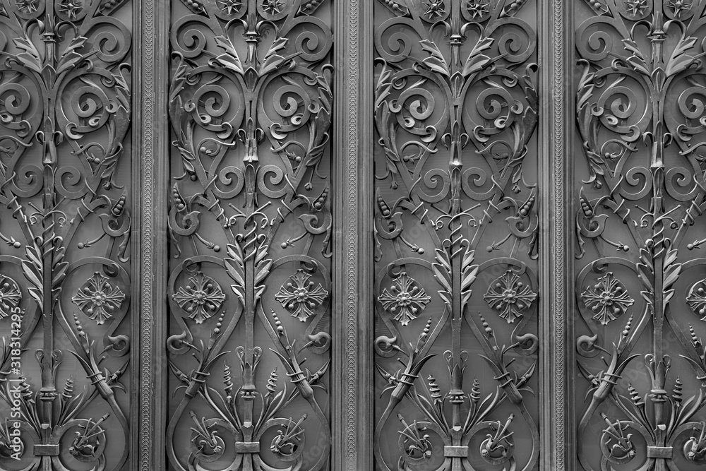 Detail of a wrought iron decoration on an entrance door