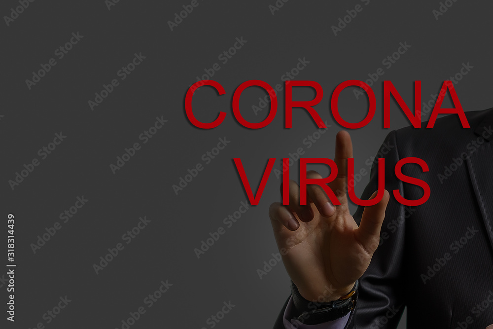 Fototapeta premium Image of businessman touching corona virus alert icon