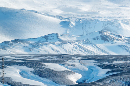 Snow-covered mountain range in the central highlands of Iceland