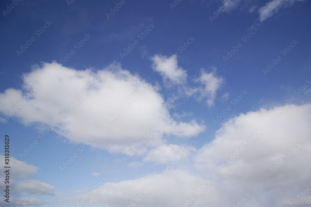 background of white fluffy cumulus clouds background of white fluffy cumulus clouds