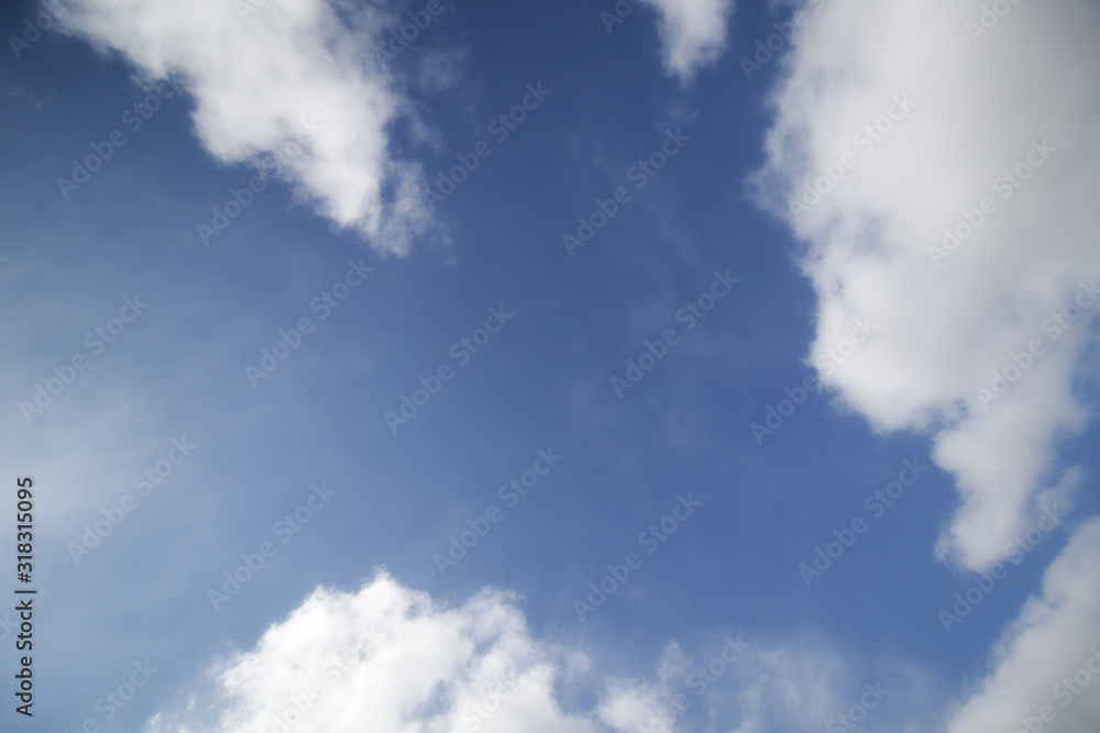 background of white fluffy cumulus clouds background of white fluffy cumulus clouds