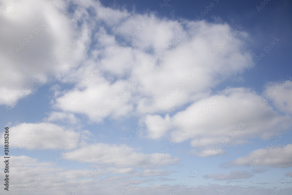 background of white fluffy cumulus clouds background of white fluffy cumulus clouds