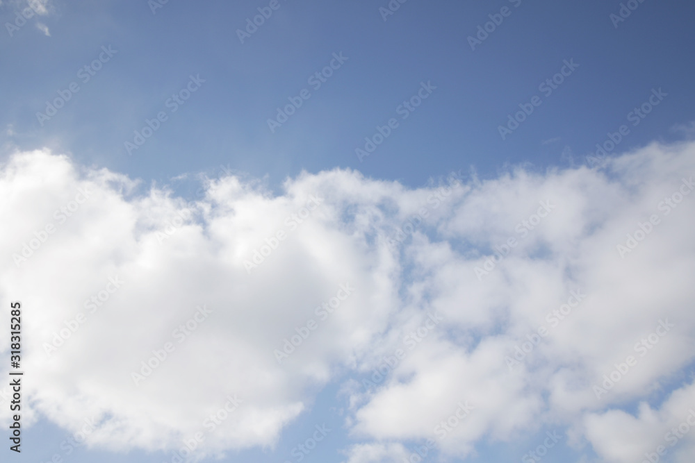 background of white fluffy cumulus clouds background of white fluffy cumulus clouds