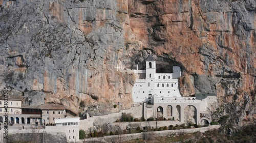 Ostrog Monastery in Montenegro - St. Basil (Sveti Vasilije). This pilgrimage place is managed by Serbian Orthodox Church and is situated high up in a vertical rock. Aerial footage. 
