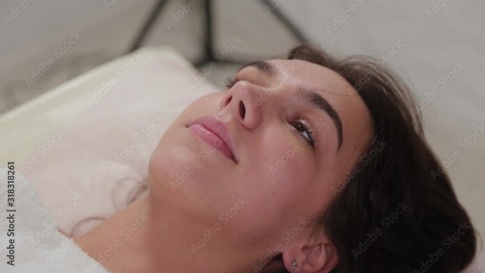 Beautiful young girl on a couch in a beauty salon. Beautiful young girl on a couch in a beauty salon.