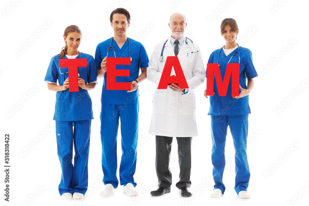Doctors holding team letters Doctors holding team letters