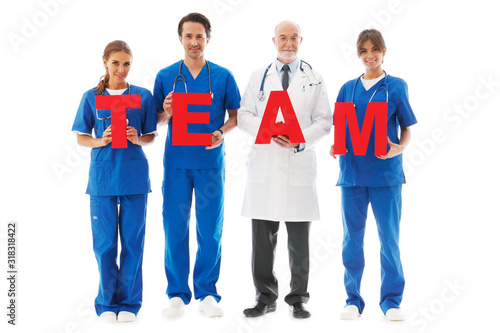 Doctors holding team letters