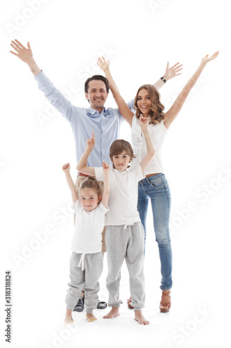 Family with raised hands on white