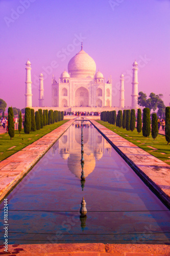 The Taj Mahal is an ivory-white marble mausoleum on the south bank of the Yamuna river in the Indian city of Agra. photo