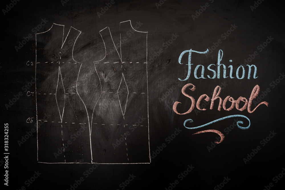 Fashion school. Drawing of a pattern on a blackboard in a design studio for sewing and tailoring, special education concept, place for insertion Fashion school. Drawing of a pattern on a blackboard in a design studio for sewing and tailoring, special education concept, place for insertion