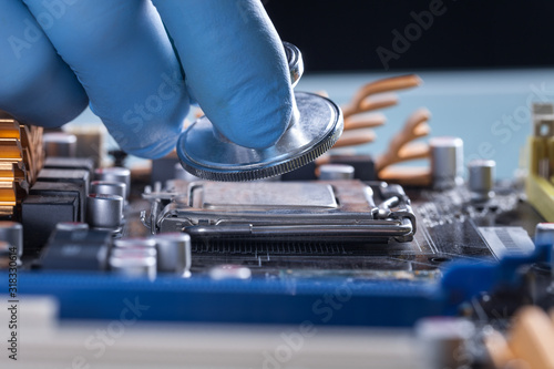 Scientist or doctor working with a computer motherboard