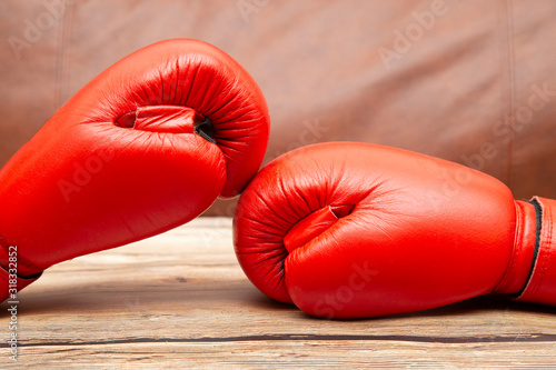 Boxing red gloves. Close up. Concept for a Boxing fight.
