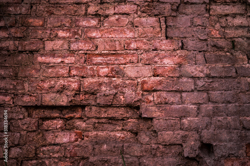 Old brick wall texture for background. Ancient building wall. Wall of destroyed buildings. Rustic wall  vintage background.