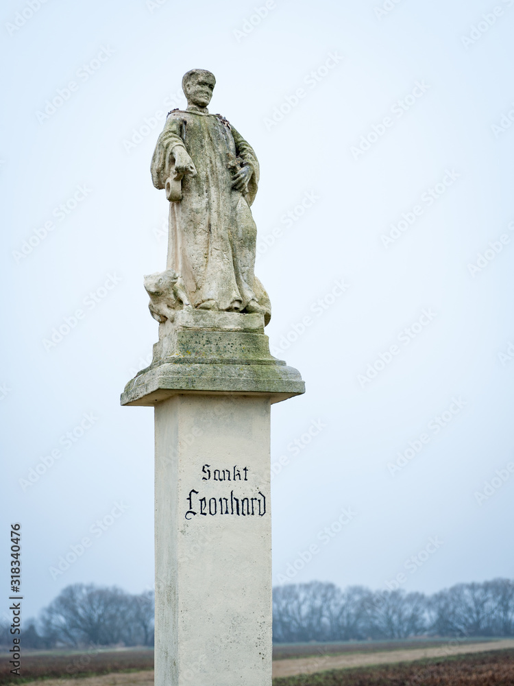 Column with statue of saint leonhard in burgenland