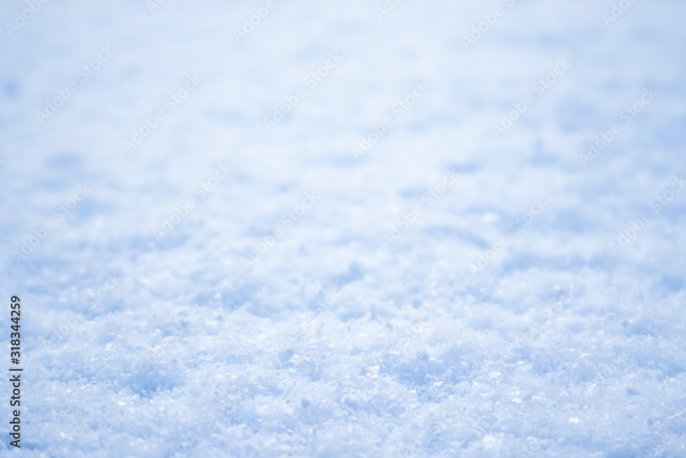 Obraz premium Bright white blue light snow macro winter texture