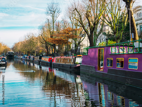 Parked boats in Regent's canal in Little Venice district, London photo