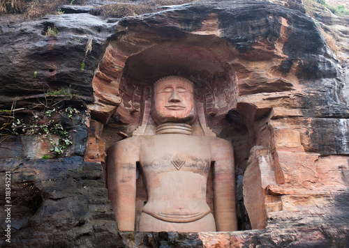 Ancient giant Jain statue carved out of rock in Gwalior, Madhya Pradesh, India photo