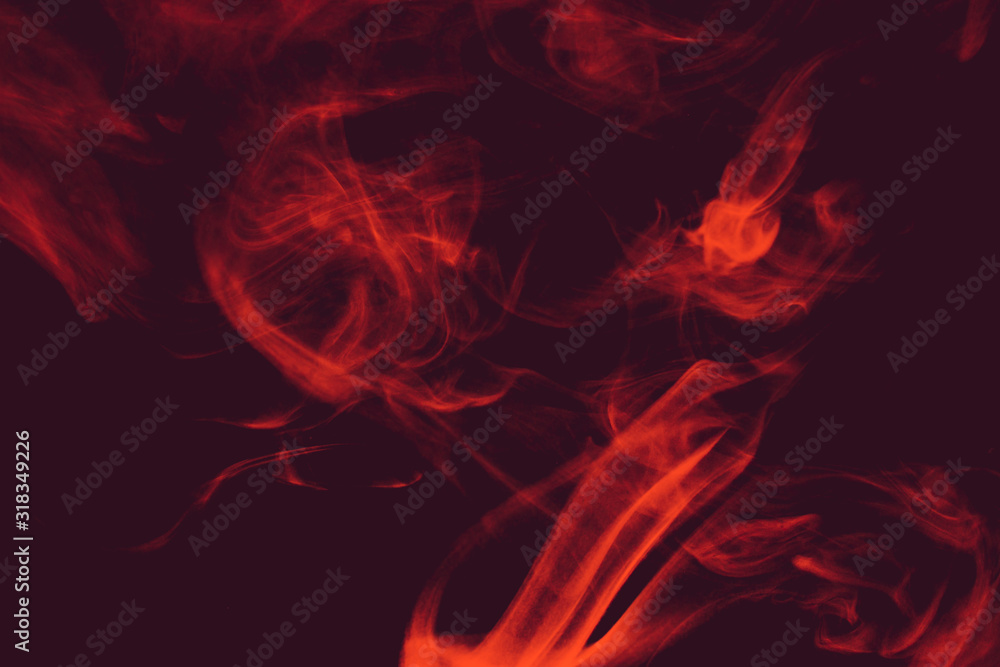 Fototapeta premium Fancy colored smoke. Curls and clouds of colored smoke.