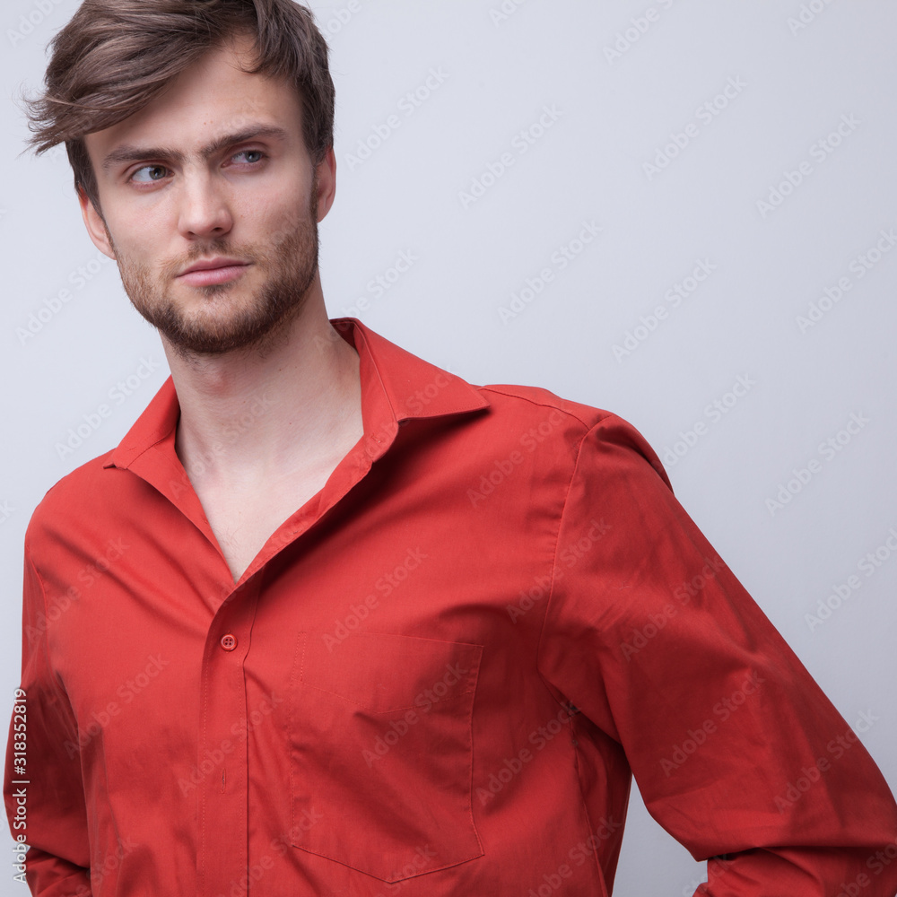 Obraz premium Handsome young elegant man studio portrait.