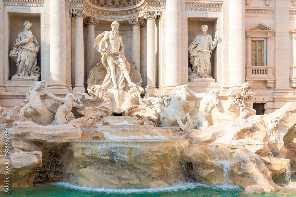 Famous landmark fountain di Trevi in Rome, Italy during summer sunny day.