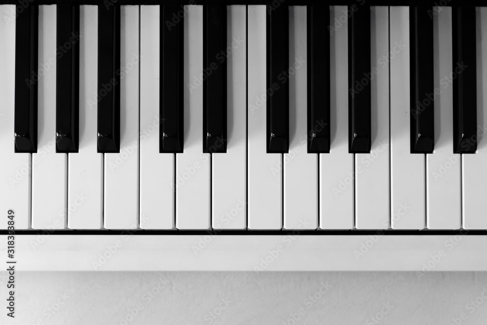 View from above of a piano keyboard on the upper half of frame. Copy space View from above of a piano keyboard on the upper half of frame. Copy space