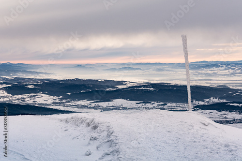 Cloudy winter day in mountains © Marcin