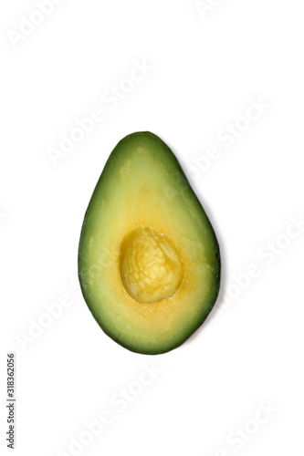 Obraz na płótnie Half avocado. Seedless avocado isolated on the white background. w salonie