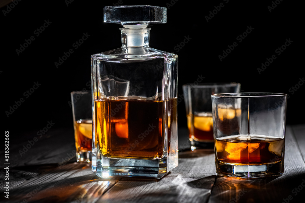 a glass of whiskey with ice a glass of whiskey with ice