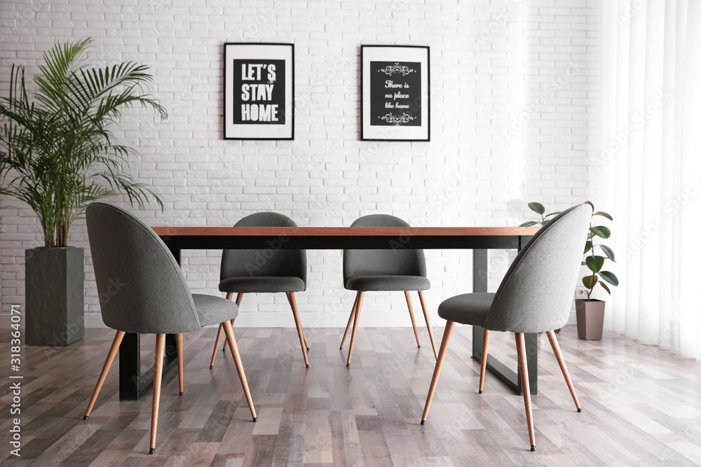 Fototapeta premium Modern dining room interior with stylish furniture