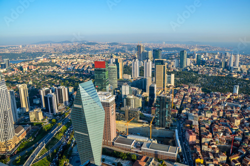 Aerial panoramic view of business Istanbul, overlooking the Bosphorus before sunset, Turkey 