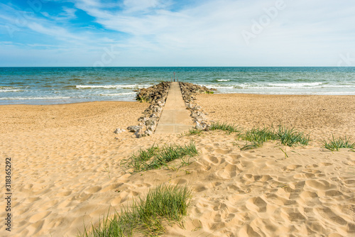 Valokuva Stone Groynes on Branksome Dene Chine beach