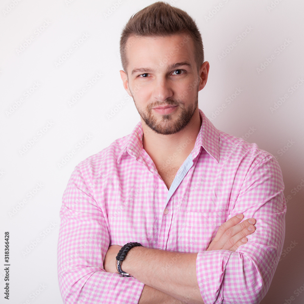 Handsome young elegant man studio portrait. Handsome young elegant man studio portrait.