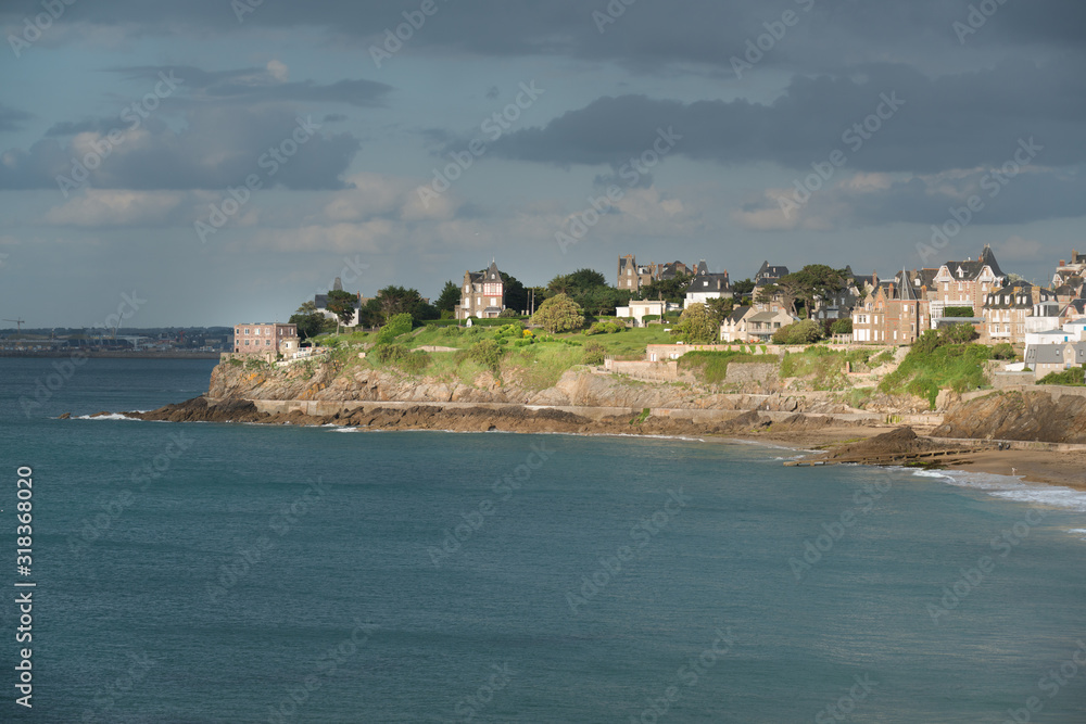 Panorama of Dinard, famous holiday destination on Breton coastline,  with Saint-Malo in the distance, Brittany, France
