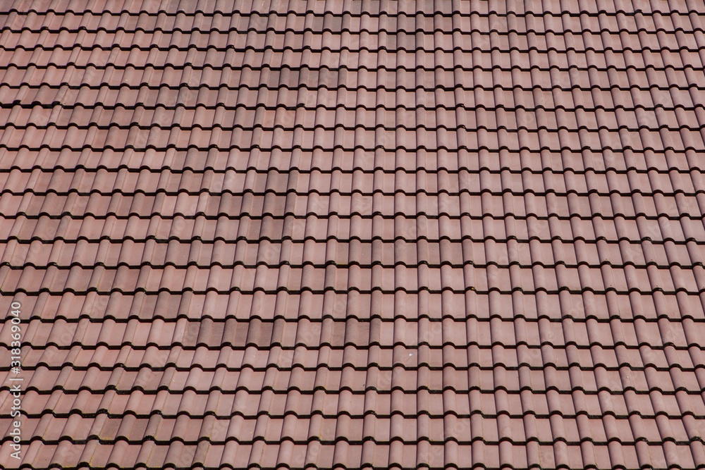 Brown roof with metal tile on blue sky Brown roof with metal tile on blue sky