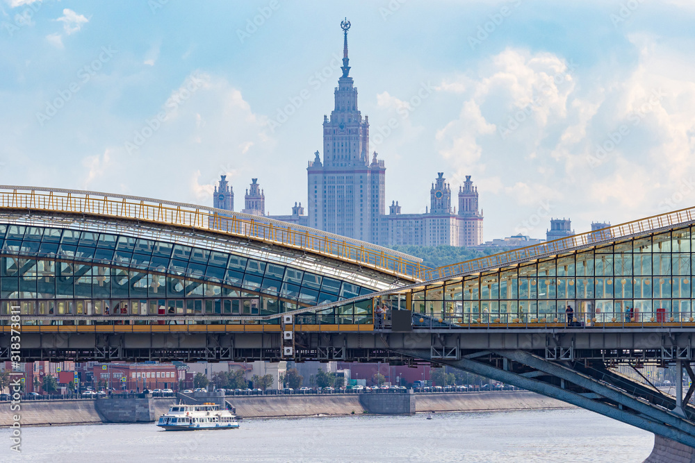 Moscow. Glazed pedestrian bridges across the river Moscow. Architecture of the capital of Russia. High-rise building on Kotelnicheskaya embankment. Sight of Moscow. Panorama of the Russian capital.