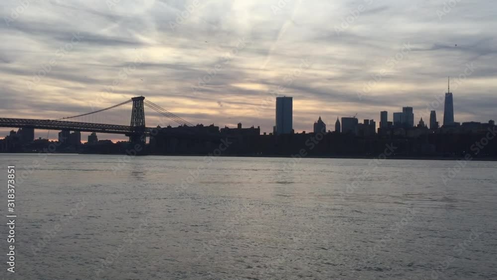 New city skyline across river skyscrapers of downtown Manhattan stock footage video New city skyline across river skyscrapers of downtown Manhattan stock footage video