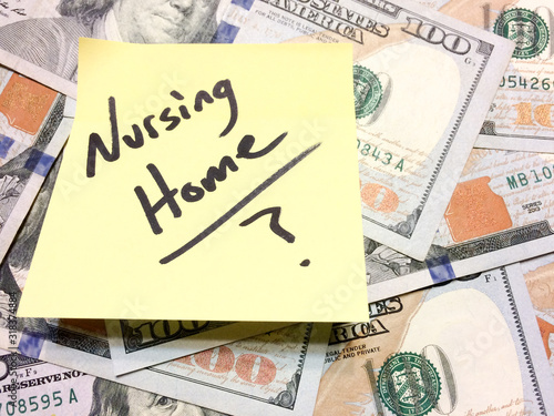 American cash money and yellow paper note with text Nursing Home with question mark