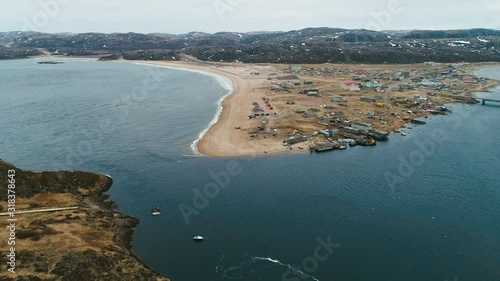 RUSSIA, KOLA PENINSULA, MURMANSK AREA, TERIBERKA VILLAGE – drone zooming out the north sea coast, drone fly over teriberka