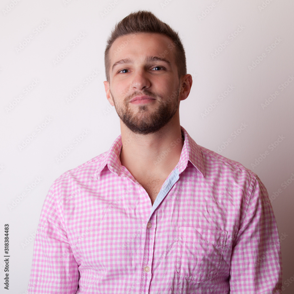 Handsome young elegant man studio portrait. Handsome young elegant man studio portrait.