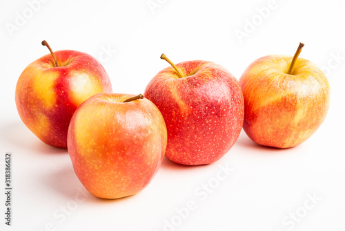 Four Fresh Red Apples