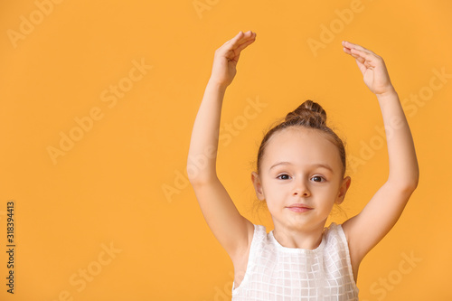 Cute little ballerina on co...