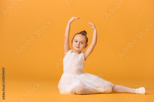 Cute little ballerina on co...